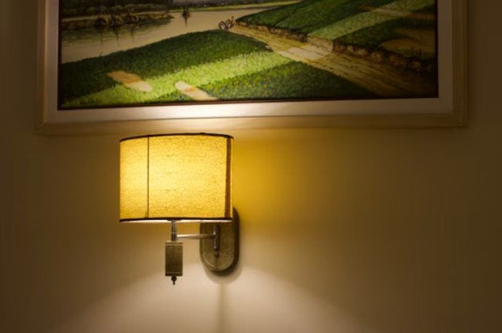 What materials and designs should you look for when buying decorative wall lights?